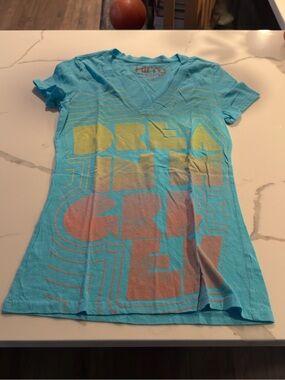 Kirra Aqua V-Neck Tee with Yellow and Coral Graphic